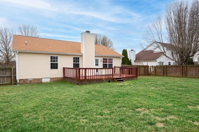 rear view of house with a deck, a fenced backyard, a yard, crawl space, and a chimney