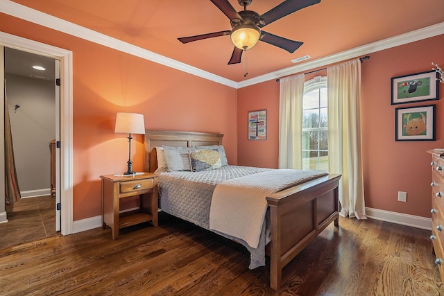 bedroom with ceiling fan, dark wood-type flooring, and ornamental molding