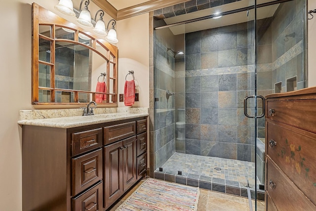 bathroom with vanity and an enclosed shower