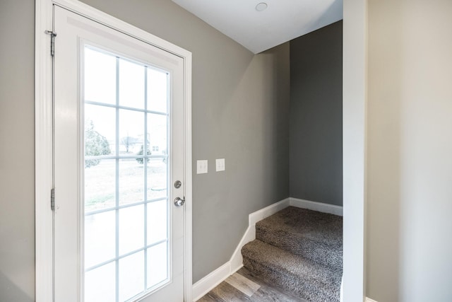 doorway to outside featuring hardwood / wood-style flooring