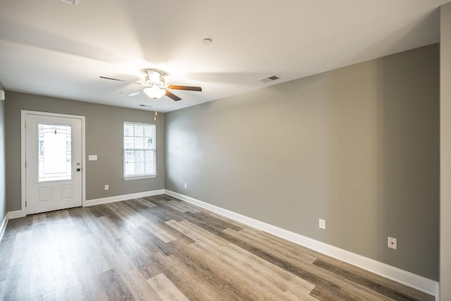 entryway with hardwood / wood-style flooring and ceiling fan