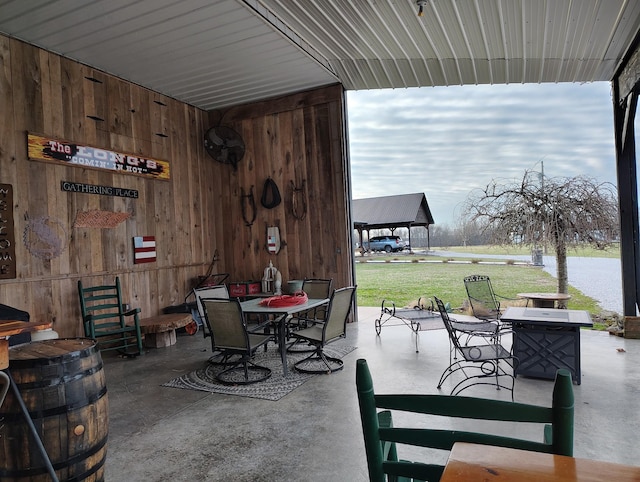 view of patio with a water view