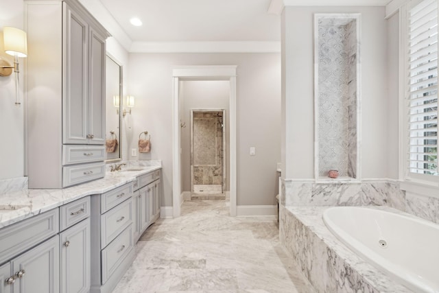 full bath with vanity, baseboards, ornamental molding, a jetted tub, and a shower stall