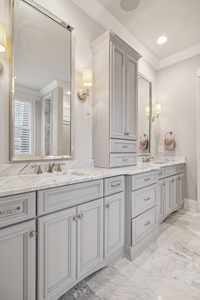 bathroom featuring ornamental molding, recessed lighting, marble finish floor, and vanity