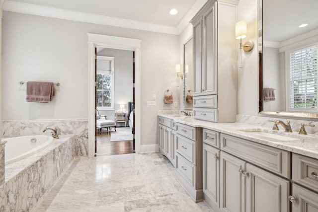 ensuite bathroom featuring marble finish floor, double vanity, a sink, and connected bathroom