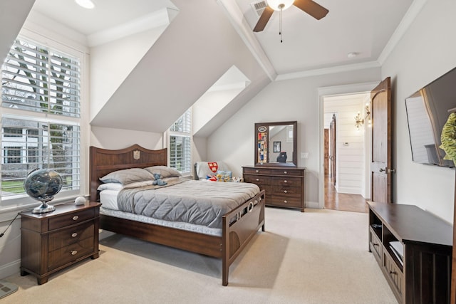 bedroom featuring ceiling fan, light colored carpet, visible vents, vaulted ceiling, and crown molding