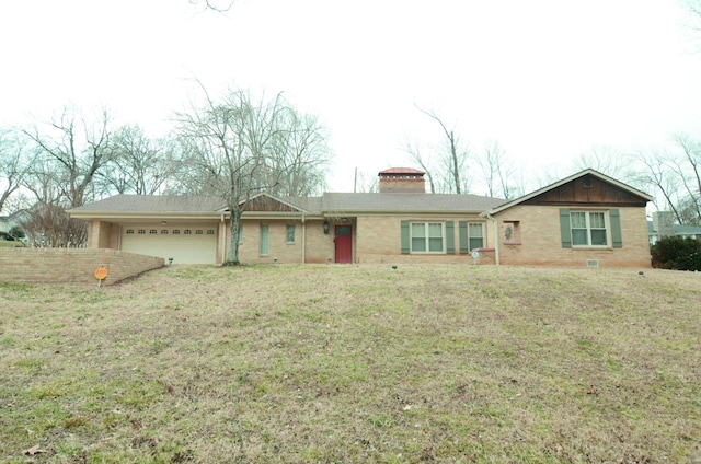 ranch-style home with a front lawn and a garage