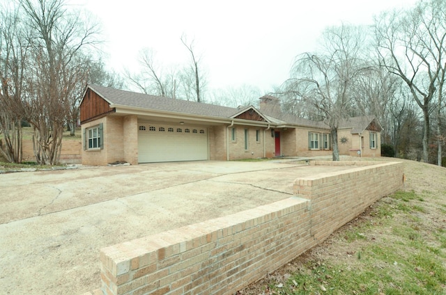 ranch-style home featuring a garage