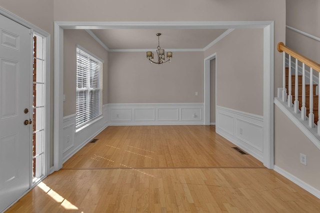 9746 Northfork Dr, Brentwood, TN 37027 - unfurnished dining area featuring stairs, light wood-style floors, visible vents, and a notable chandelier