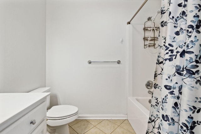 bathroom with tile patterned flooring, toilet, vanity, baseboards, and shower / bath combination with curtain