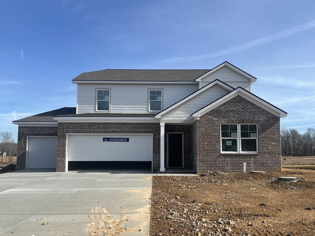 view of front of property featuring a garage