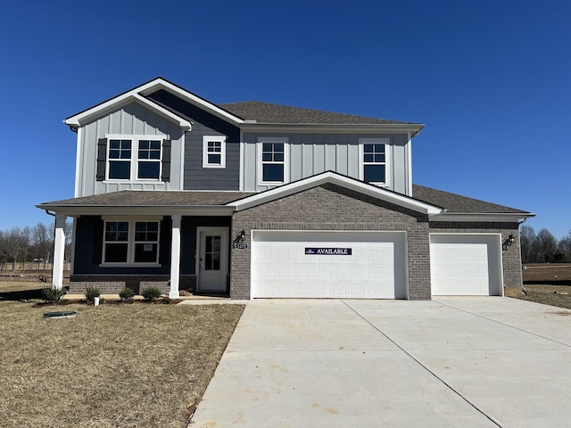 view of front of home featuring an attached garage, covered porch, brick siding, concrete driveway, and board and batten siding