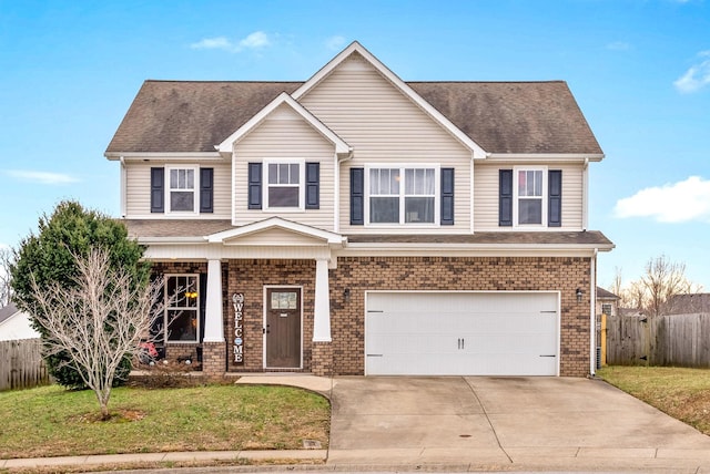 view of front of home featuring a front lawn and a garage