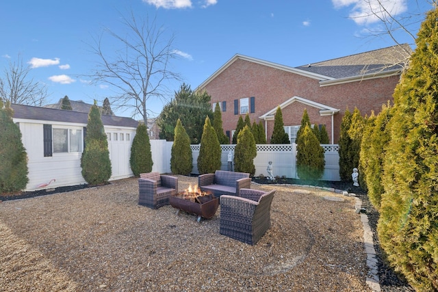 view of yard with a fire pit