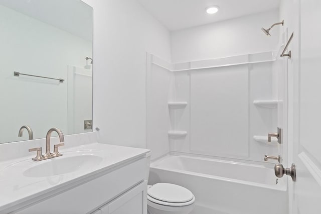 full bathroom with toilet, shower / bathing tub combination, and vanity