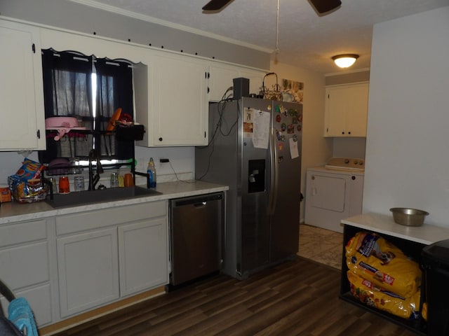 kitchen with sink, stainless steel appliances, and white cabinetry