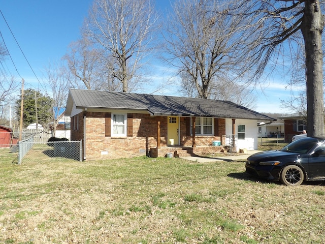 ranch-style home with covered porch and a front lawn