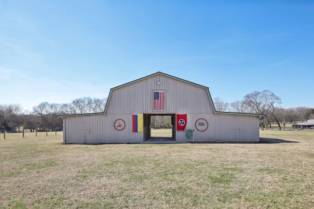 view of outbuilding with a lawn