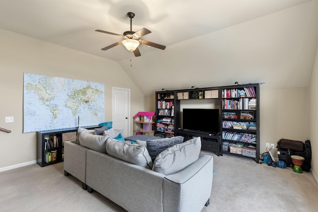 living room featuring ceiling fan, vaulted ceiling, and light carpet