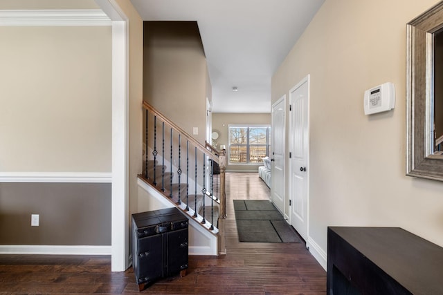 corridor featuring dark hardwood / wood-style floors