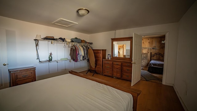 bedroom featuring wood-type flooring