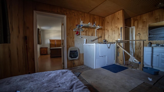 laundry area with wooden ceiling, heating unit, and wooden walls