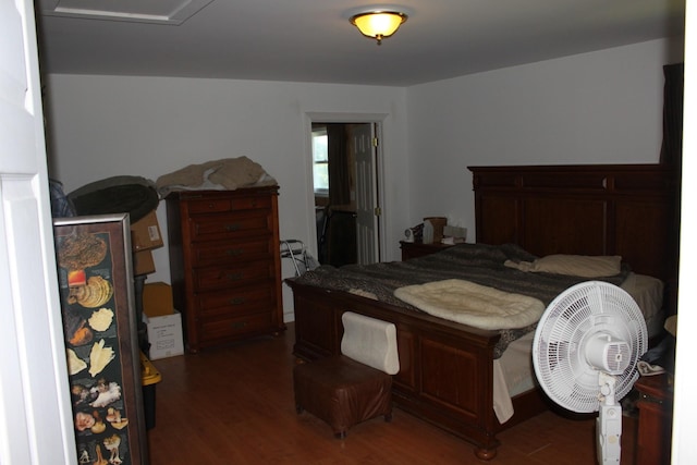 bedroom featuring dark hardwood / wood-style floors