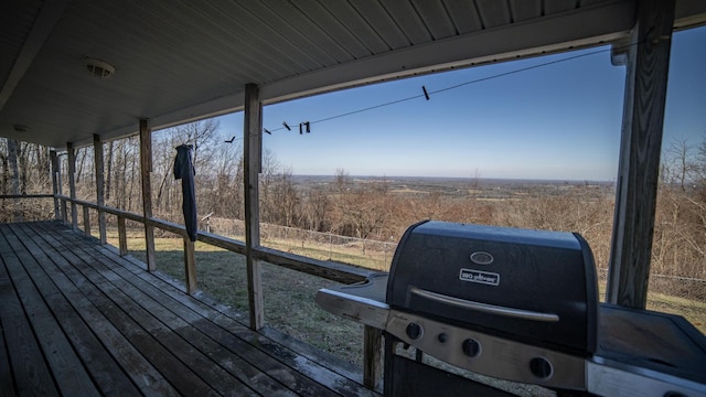 wooden terrace with grilling area