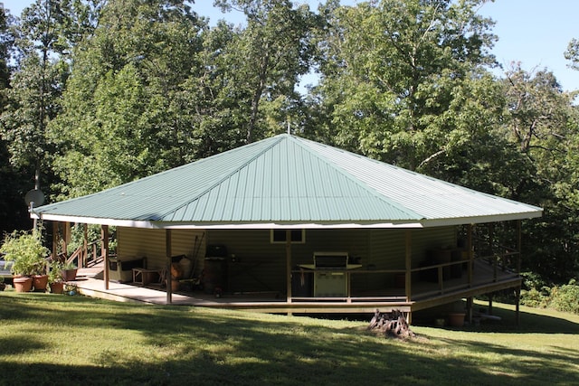 exterior space featuring a patio and a lawn