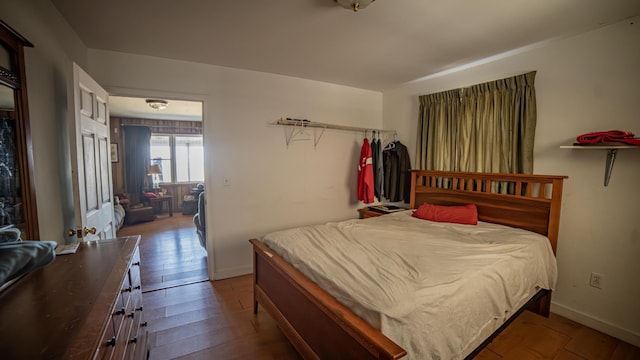 bedroom featuring hardwood / wood-style flooring