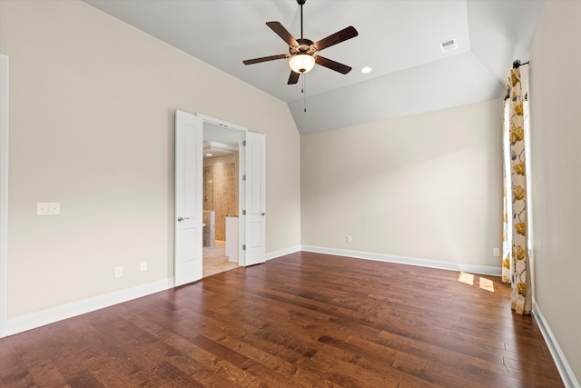 unfurnished room with ceiling fan, dark wood-type flooring, and vaulted ceiling