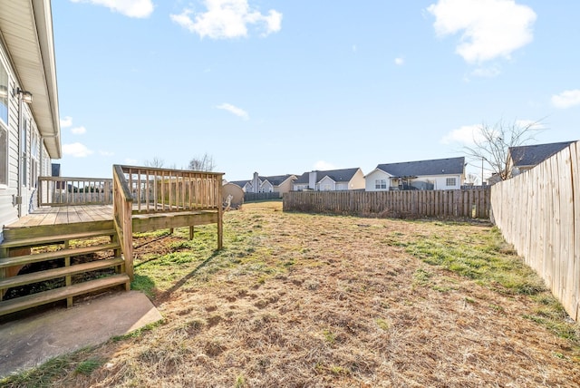 view of yard with a deck