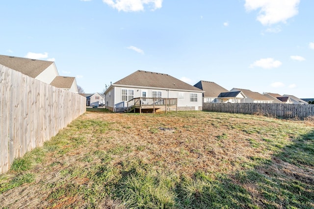 view of yard with a deck