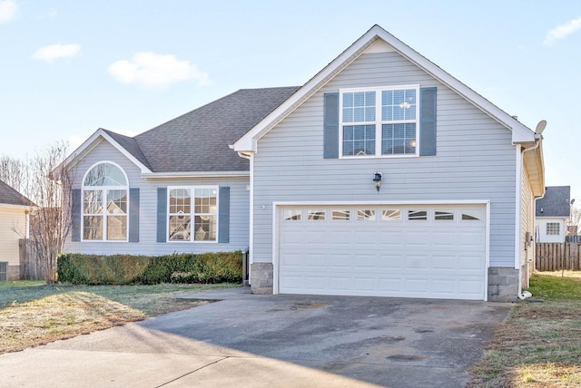 front of property with a garage