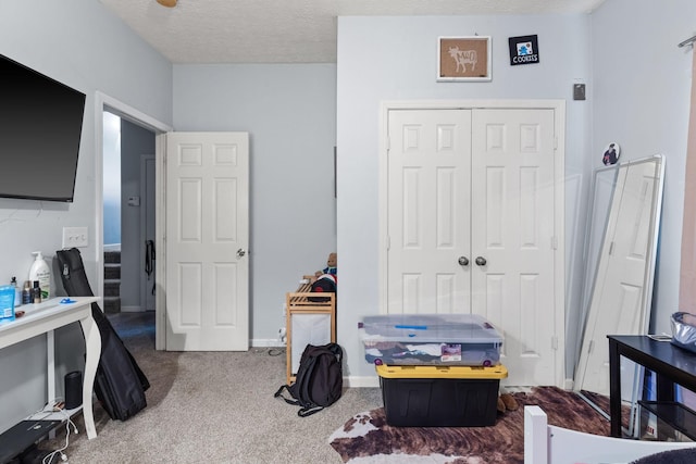 interior space featuring a closet and a textured ceiling