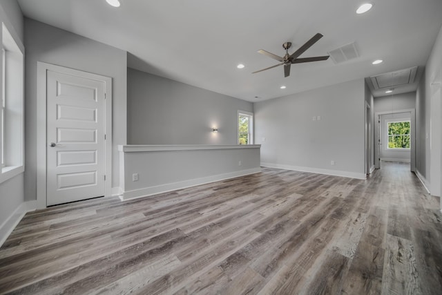 unfurnished room featuring ceiling fan and light hardwood / wood-style flooring