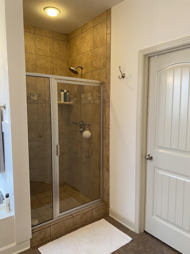 5107 General Eisenhower Dr, Murfreesboro, TN 37129 - full bath featuring baseboards, a shower stall, and tile patterned floors