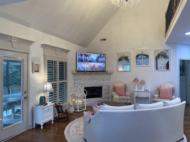 5107 General Eisenhower Dr, Murfreesboro, TN 37129 - living room with high vaulted ceiling, dark wood-style flooring, a fireplace, and visible vents