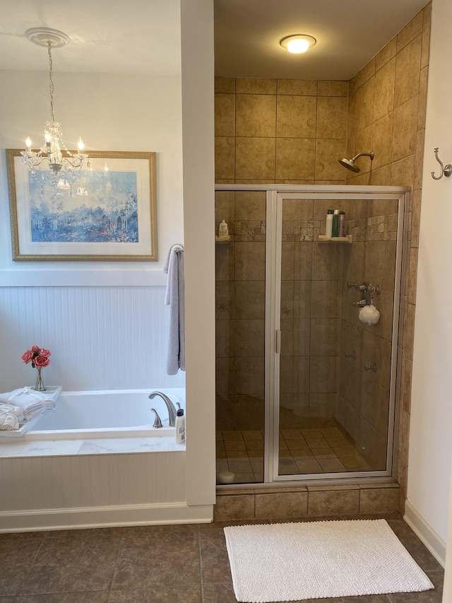 5107 General Eisenhower Dr, Murfreesboro, TN 37129 - bathroom with a wainscoted wall, a shower stall, a bath, and an inviting chandelier