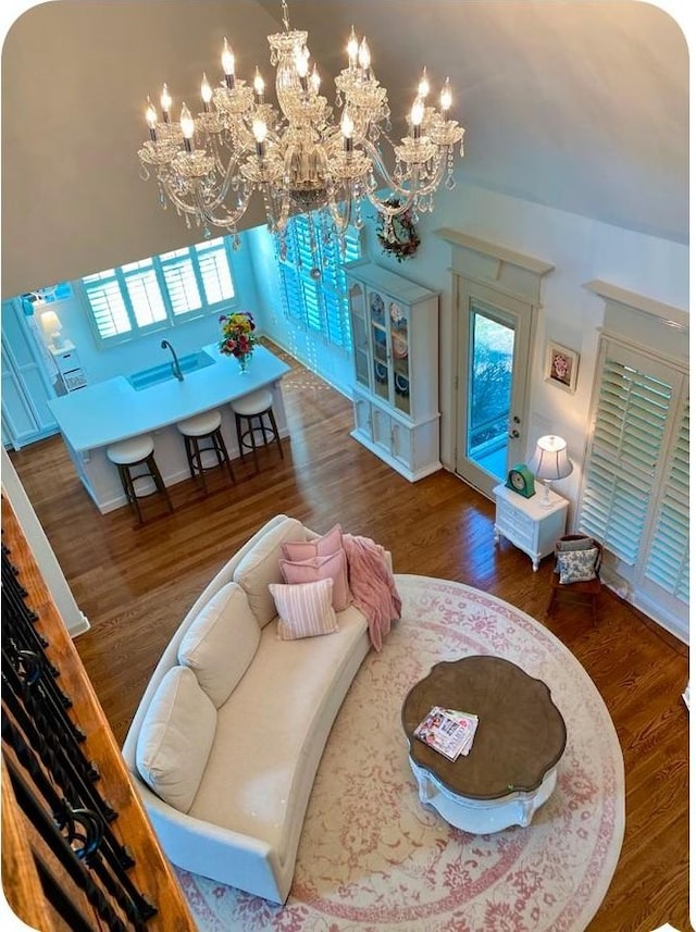 5107 General Eisenhower Dr, Murfreesboro, TN 37129 - living area with dark wood-style floors and a notable chandelier