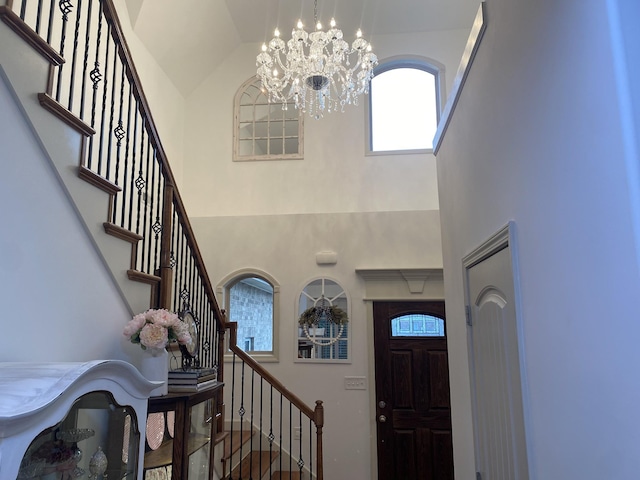 5107 General Eisenhower Dr, Murfreesboro, TN 37129 - entryway featuring stairs, a towering ceiling, and a notable chandelier