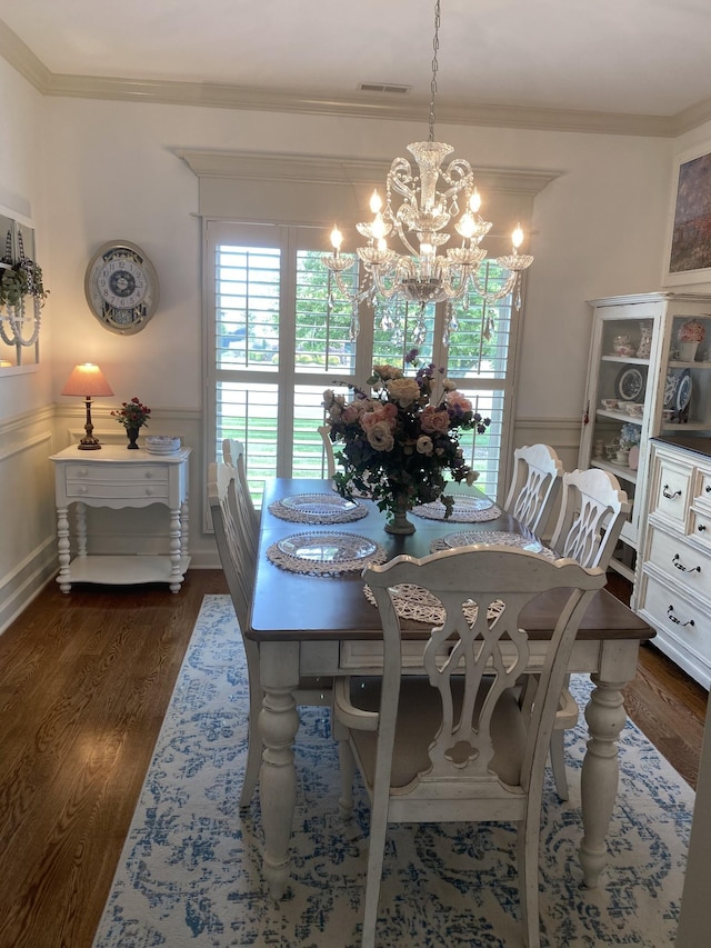 5107 General Eisenhower Dr, Murfreesboro, TN 37129 - dining area with ornamental molding, dark wood-type flooring, wainscoting, and visible vents