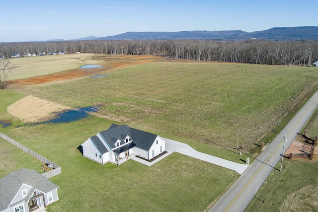 bird's eye view featuring a mountain view and a rural view