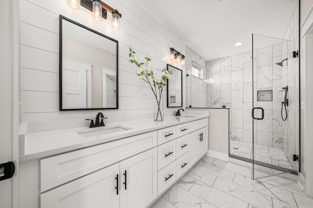 bathroom with an enclosed shower and vanity