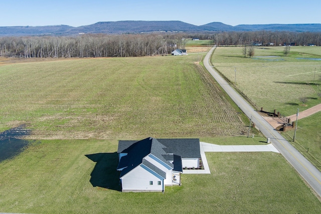 bird's eye view featuring a rural view and a mountain view