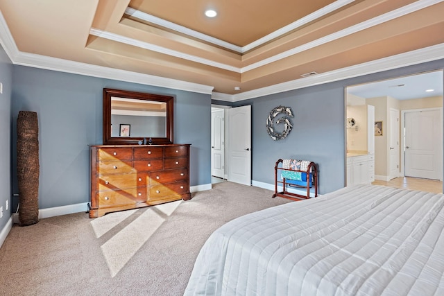 bedroom with a raised ceiling, light carpet, connected bathroom, and ornamental molding