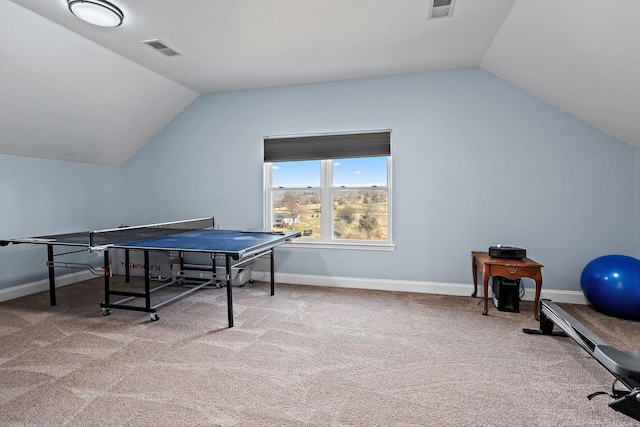 playroom featuring lofted ceiling and carpet floors