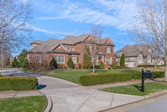 view of front of home with a front lawn