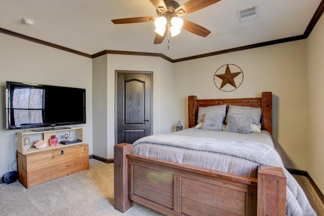 bedroom featuring ceiling fan, crown molding, and light colored carpet