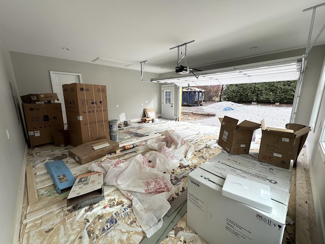 garage featuring a garage door opener